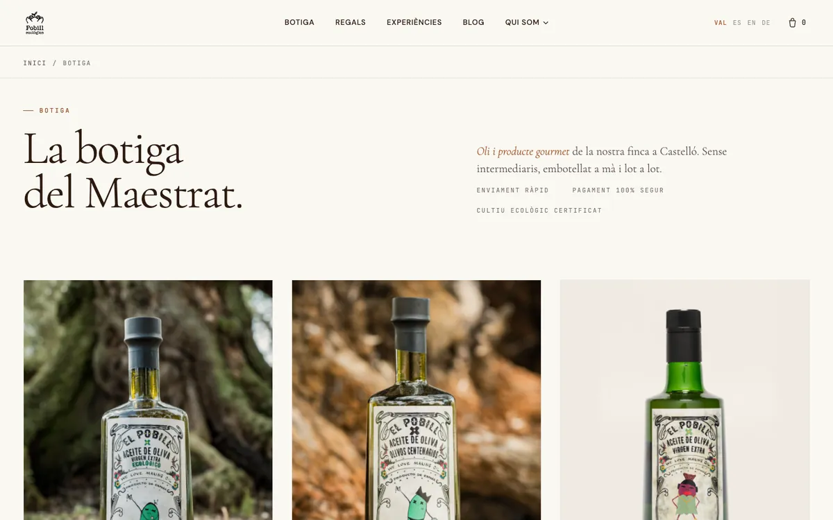Tienda del rediseño de Pobill: titular «La botiga del Maestrat» y tarjetas con fotografías de las botellas